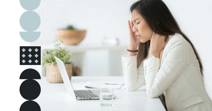 Woman holding head in pain