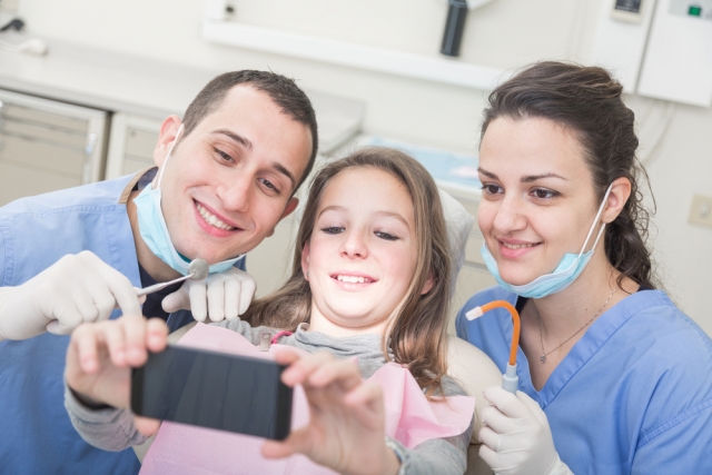 dental staff using technology